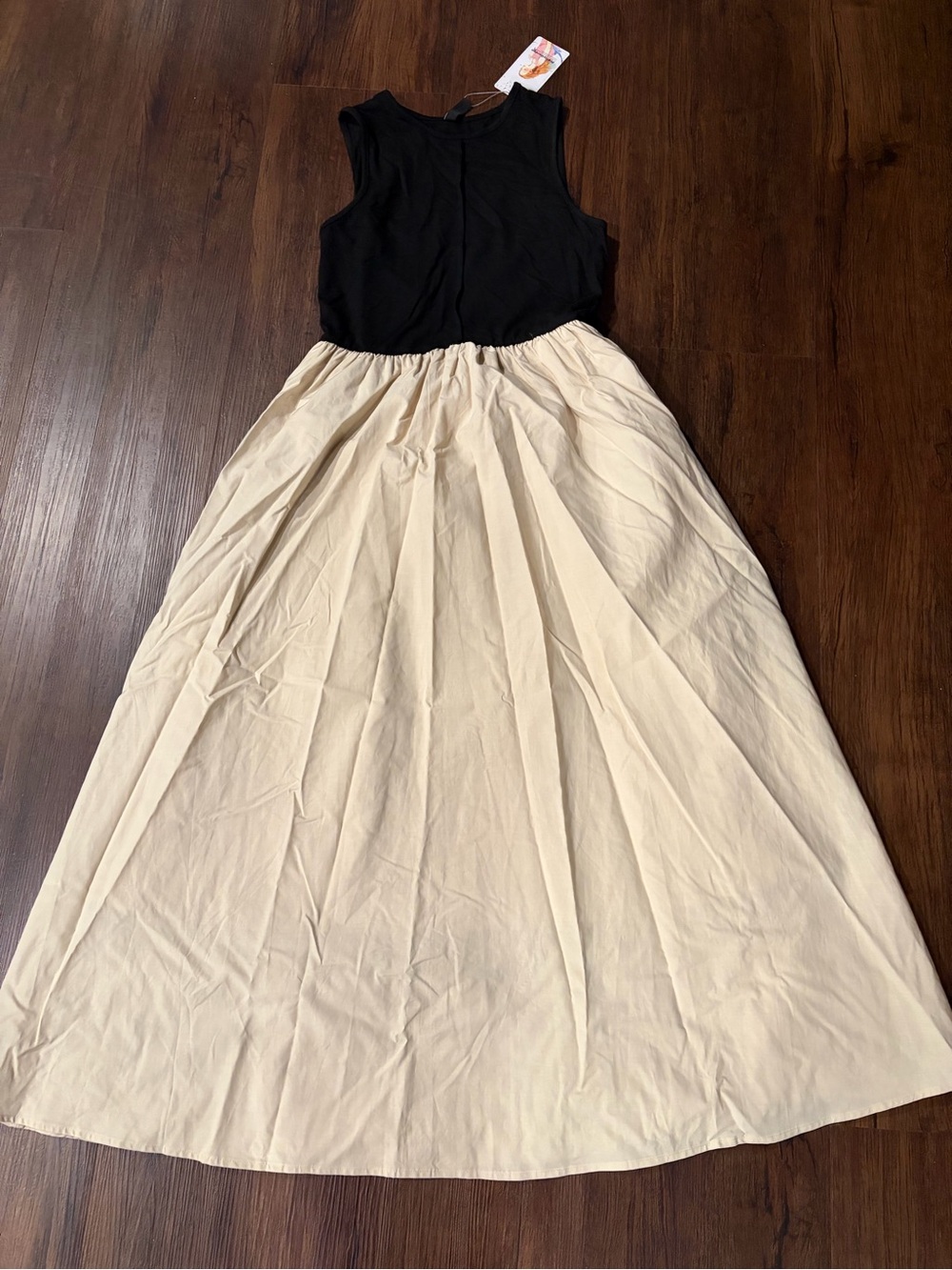 Two-Tone Black and Cream Dress by Pretty Garden Size Small. Has pockets . NWT